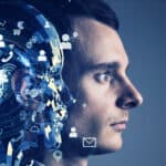 Human head and artificial intelligence head side by side.
